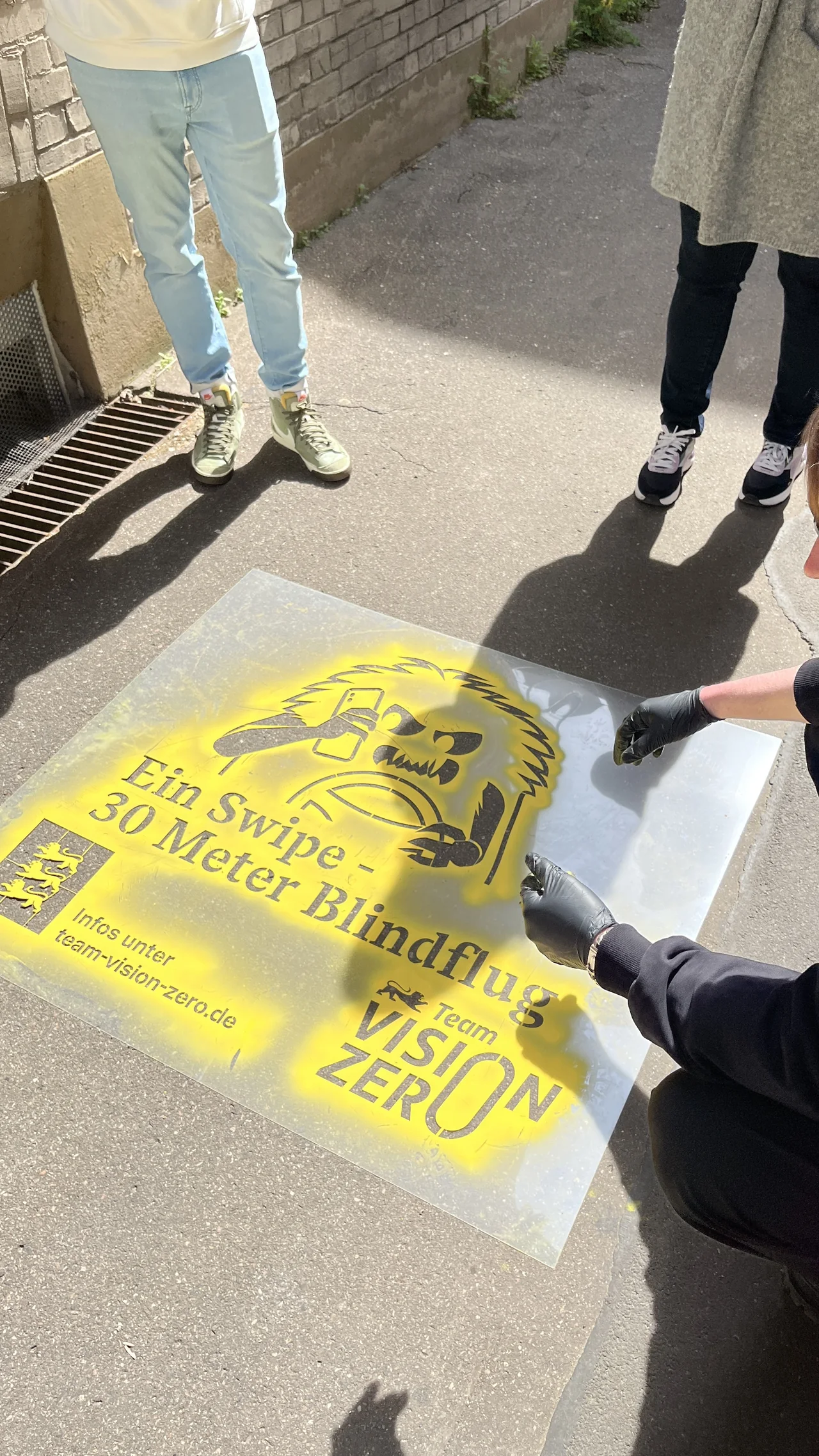 Stencil-Aktion zu Blindflug und Team Vision Zero im Straßenraum.